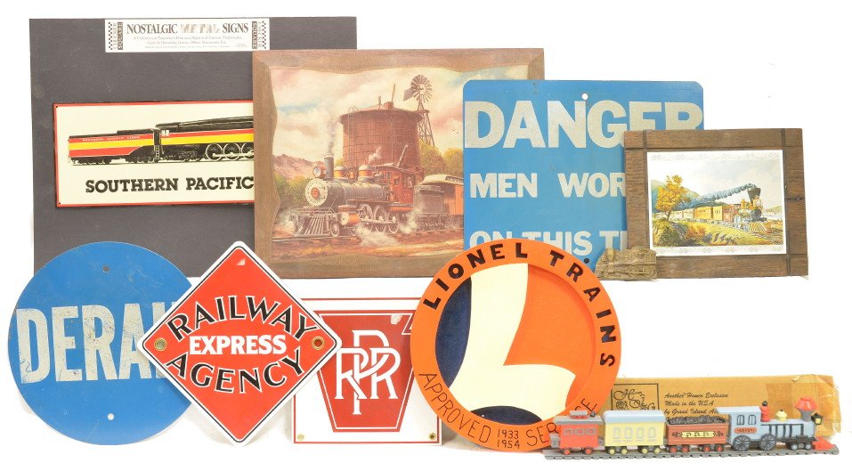 Selection of Metal RR Signs Plaques Prints: Selection of metal Railroad signs, belt buckle, plastic train plaque, wooden Lionel trains plaque and train prints mounted on wood frames. Also included is a 50 X 26 inch framed painting. The picture