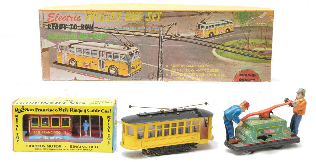 Metal SF Cable Car Silvine Trolley Set Hand Car: Metal San Francisco bell ringing cable car with friction motor and a Silvine Model Importers, Inc. electric trolley bus set both in OBs, Also included is a lithographed hand car and trolley. All items