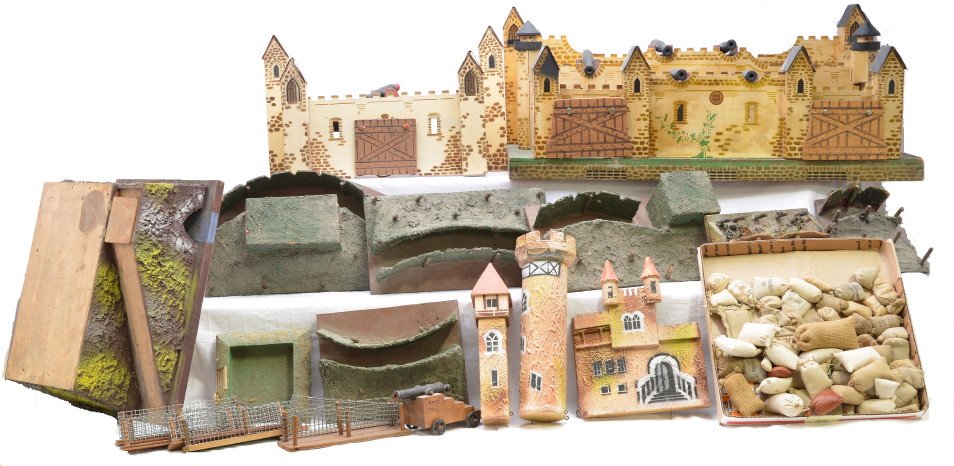 Rich Toys Clinton Iowa two Wooden Castles: Rich Toys, Clinton, Iowa two wooden castles, one large and one small with draw bridges, cannons and trench bags. Also included are pieces for a moat. Please view photo to verify selection and conditio