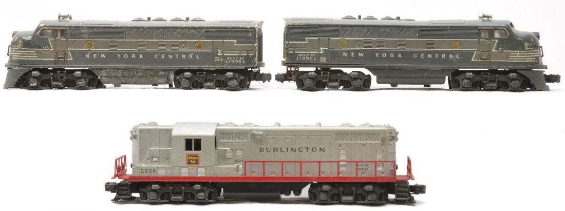 Lionel 2344 NYC F3 AA 2328 Burlington GP7: Lionel postwar 2344 New York Central F3 AA diesel units. The dummy unit has a melted top. Also included is a 2328 Burlington GP-7 diesel. The 2344 units and 2328 are C4.