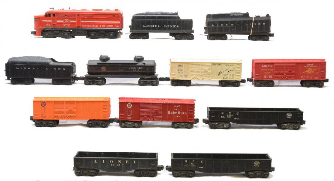 Lionel 229 243W 1130T 6066T 6014 6465 6004 6014: Lionel postwar 229 Minneapolis & St. Louis Alco A unit, 243W tender that is broken, 1130T tender, 6066T tender and freight cars including; 6014 Airex boxcar, 6014 Frisco boxcar, 6465 black Gulf two do