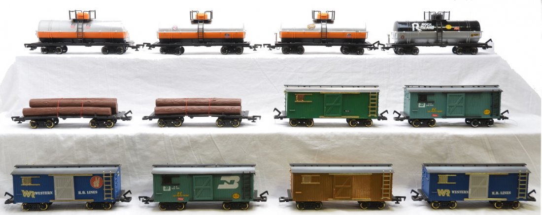New Bright 4-Tanks 3-Log Cars 6-Boxcars: New Bright G scale three Union Pacific Tanks, Rock Island tank, two log cars and six boxcars, C7. Please allow for shipping charges on this lot.