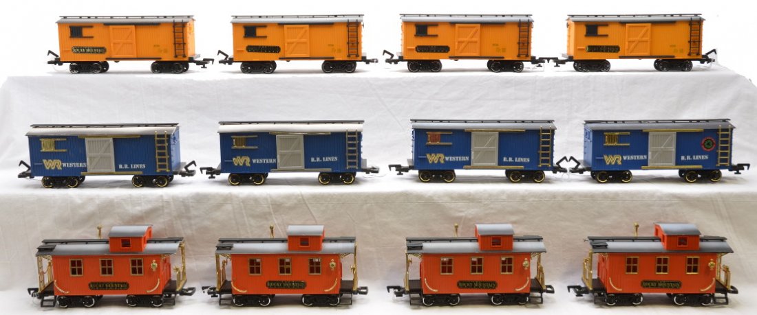 New Bright 4-WRR 4-RM Boxcars 4-Cabooses: New Bright G scale four blue Western R.R. Lines boxcars, four yellow Rocky Mountain boxcars and four orange Rocky Mountain cabooses, C7. Please allow for shipping charges on this lot.