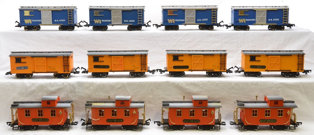 New Bright 4-WRR 4-RM Boxcars 4-Cabooses: New Bright G scale four blue Western R.R. Lines boxcars, four yellow Rocky Mountain boxcars and four orange Rocky Mountain cabooses, C7. Please allow for shipping charges on this lot.