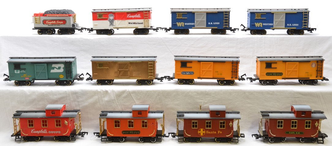 New Bright Campbells Cars 6-Boxcars 3-Cabooses: New Bright G scale CampbellÕs tender, boxcar and caboose. Also included are six boxcars and three cabooses, C7. Please allow for shipping charges on this lot.