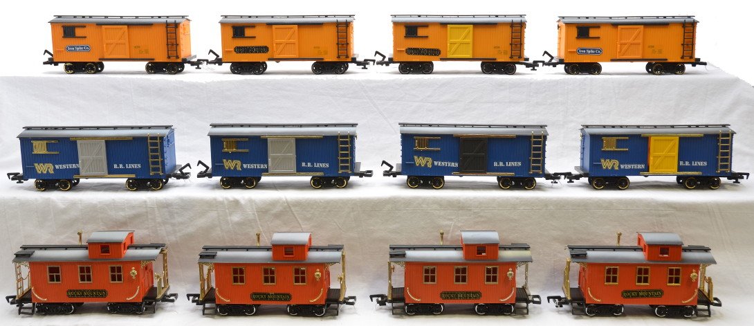 New Bright 4-WRR 2-RM 2-IS Boxcars 4-Cabooses: New Bright G scale four blue Western R.R. Lines boxcars, two yellow Rocky Mountain boxcars, two yellow Iron Spike boxcars and four orange Rocky Mountain cabooses, C7. Please allow for shipping charges