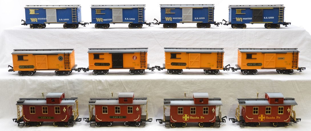 New Bright 4-WRR 4-RM Boxcars 4-Cabooses: New Bright G scale four blue Western R.R. Lines boxcars, four yellow Rocky Mountain boxcars and four cabooses, C7. Please allow for shipping charges on this lot.