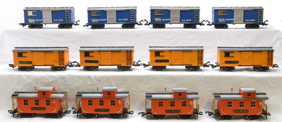 New Bright 4-WRR 4-RM Boxcars 4-Cabooses: New Bright G scale four blue Western R.R. Lines boxcars, four yellow Rocky Mountain boxcars and four orange Rocky Mountain cabooses, C7. Please allow for shipping charges on this lot.