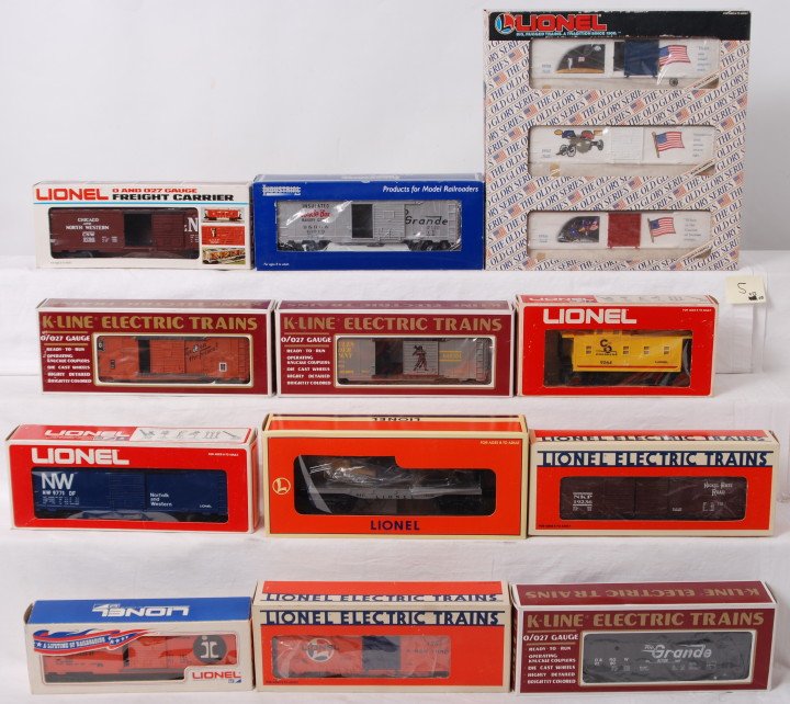 14 Lionel, K Line, IR freight cars: Modern O gauge freight cars in OBs. Fourteen cars include Lionel 19599 Old Glory three pack, 19430 Santa Fe flat with Beechcraft, 19236 Nickel Plate double door boxcar, 9492 Lionel Lines boxcar, 9064 