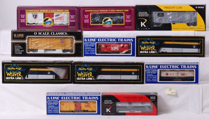11 O gauge freight cars MTH, Weaver, K Line, etc: Modern O gauge freight cars in OBs. Eleven cars include 5414-1986 TCA tank car, 5116-1986 TCA boxcar, 636-8013 Quaker State tank car, 1600, 1601, and 1603 Weaver Chesapeake and Ohio boxcars, 6115-1986