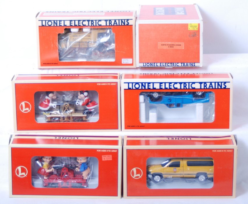 6 Lionel motorized units 18405, 8578, 18433, etc: Lionel modern O gauge motorized units in OBs. Includes 18405 Santa Fe burro crane (small piece of broken plastic), 8578 New York Central ballast tamper, 18433 Mickey hand car, 18439 Union Pacific Dodg
