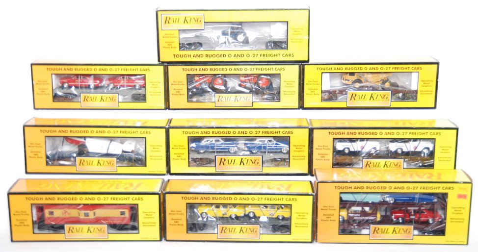 10 Railking freight cars 7628, 7623, 7607L, 7611, : MTH Railking modern O gauge freight cars in OBs. Ten cars include 7628 auto carrier with Cadillac, 7642 flat with tractors, 7640 flat with tow trucks, 7623 flat with fire cars, 7607L flat with Cadilla