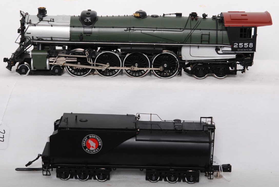 Sunset brass Great Northern S-2 4-8-4 with sound: Sunset modern brass O gauge Great Northern S-2 4-8-4 steam locomotive. Loco features QSI Sound and Suthe smoke unit. Loco is C7+ area, some paint chipping on hand rails and one or two slightly bent ha