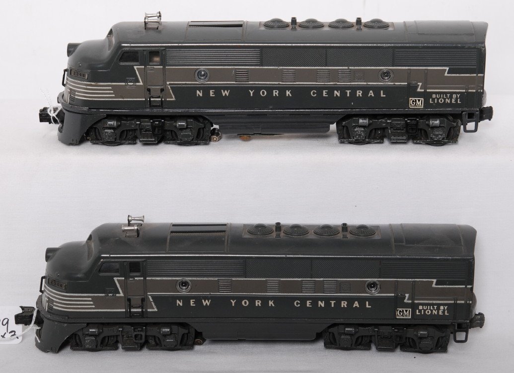 Lionel 2344P and 2344T NYC F3a diesel locomotives: Postwar Lionel O gauge 2344P and 2344T New York Central EMD F3a diesel locomotives, C5-6 with large GM decals. Repro porthole lens. Powered unit has clean chassis that has been clear coated.
