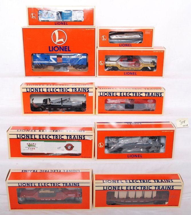 10 Lionel freight cars 19831, 16957, 16709, etc: Lionel modern O gauge freight cars in OB. Ten freight cars include 19831 GM generator car, 19832 Lionel Cola ice car, 16963 Lionel Corp flat, 16957 Lionel depressed flat with tractor, 16969 Lionel fla