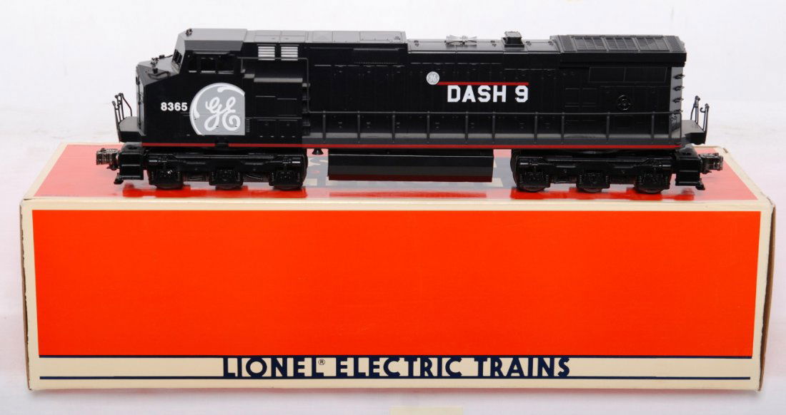Lionel 18226 GE Dash 9 demonstrator: Lionel modern O gauge 18226 General Electric dash 9 demonstrator diesel locomotive in OB. Loco features TMCC, Railsounds, Electrocouplers, and much more. Loco is C8-9 with very light signs of run time