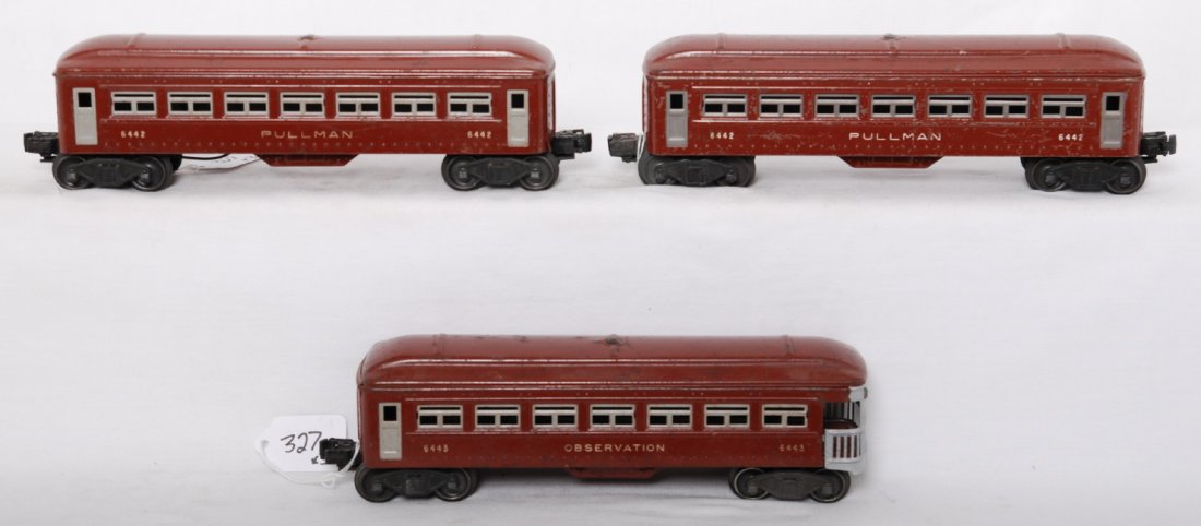 Lionel 6442, 6442, 6443 brown passenger cars: Postwar Lionel O gauge passenger cars, C5-6. Two 6442 Pullman coaches, and a 6443 observation car with heavy dirt or mild oxidation on a door.