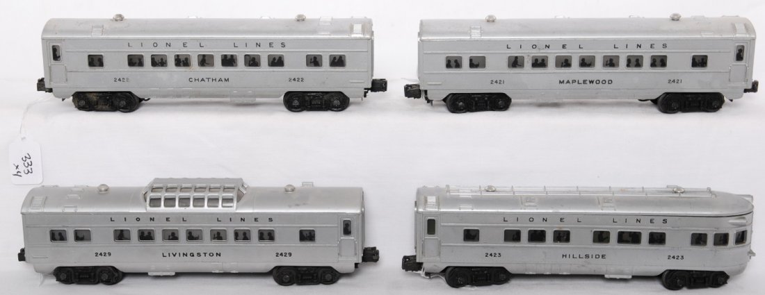 Lionel 2421, 2422, 2429, 2423 passenger cars: Postwar Lionel O gauge black letter passenger cars, C5-6. 2421 Maplewood Pullman coach, 2422 Chatham Pullman coach, 2429 Livingston vista dome, 2423 Hillside observation.