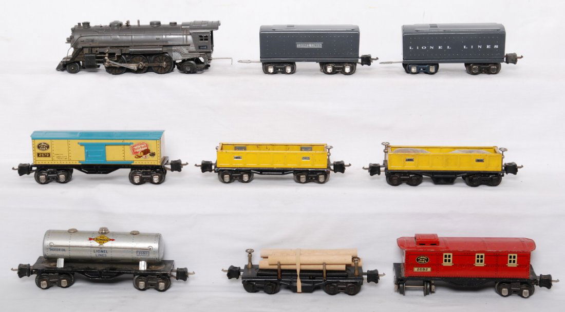 Lionel 1666E, 2689W, tender, 3651, 3652, 2652, mor: Prewar Lionel O gauge 1666E steam loco, 2689W whistle tender, unnumbered whistle tender, 2652 and 3652 gondolas, 3651 lumber car, 2679 Baby Ruth boxcar, 2680 Sunoco tank, and 2682 caboose, repainting/