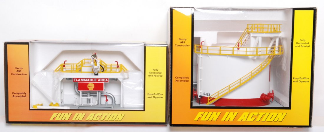 MTH Shell operating storage tank and station: MTH Railking modern O gauge Shell operating storage tank and operating tank station in OBs. Catalog numbers are 30-9140 and 30-9141. Accessories are C9-10.