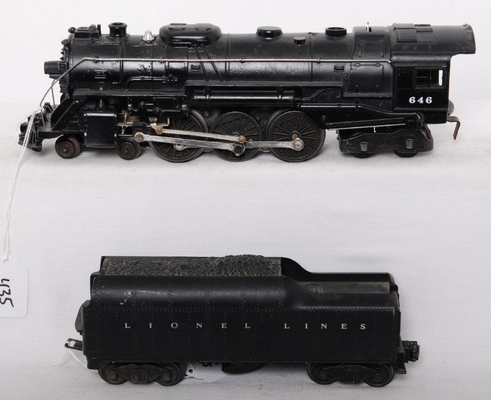 Lionel 646 steam locomotive and 2046W whistle tend: Postwar Lionel O gauge 646 steam locomotive and 2046W whistle tender w/small lettering, C6. Loco has been repainted and relettered.