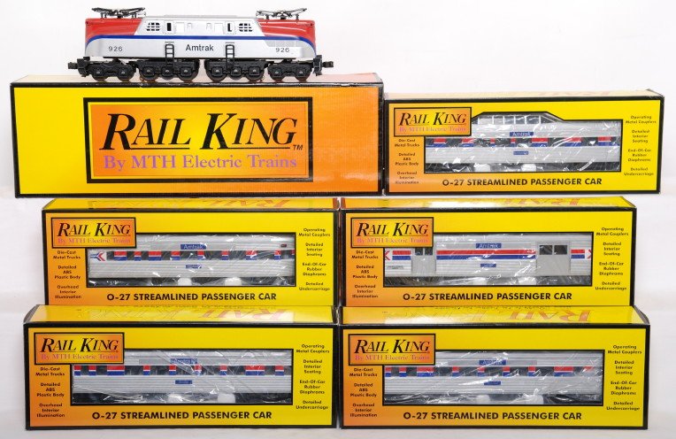 Railking Amtrak GG1 and five passenger cars: MTH Railking modern O gauge Amtrak GG-1 and five passenger cars in OBs. GG1 catalog number is RK-2502 and features dual can motors, electronic reverse, and more. Loco has some small paint chips in the