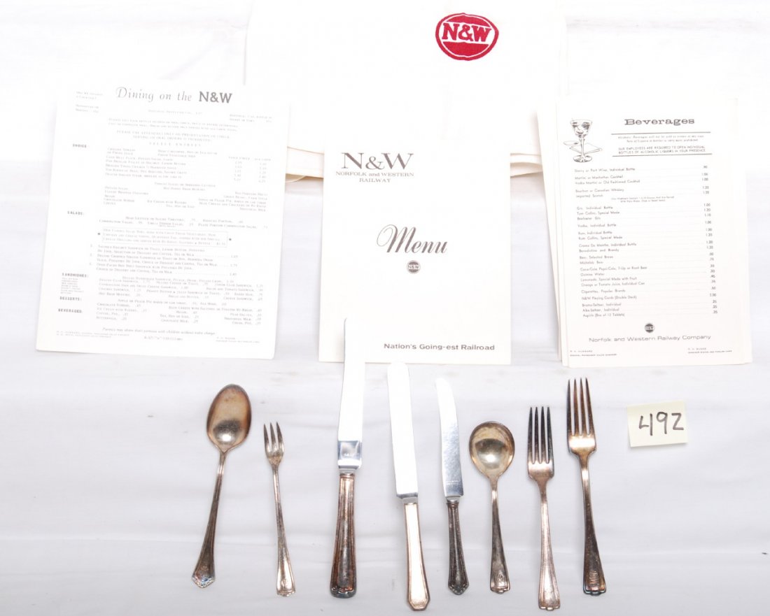 Norfolk and Western silverware, table cloth, menus: Norfolk and Western Railroadiana. Set of authentic silverware and more. Silverware includes two forks, three knives one is a Nickel Plate, soup spoon, large spoon, and a pickle fork. All are marked N&