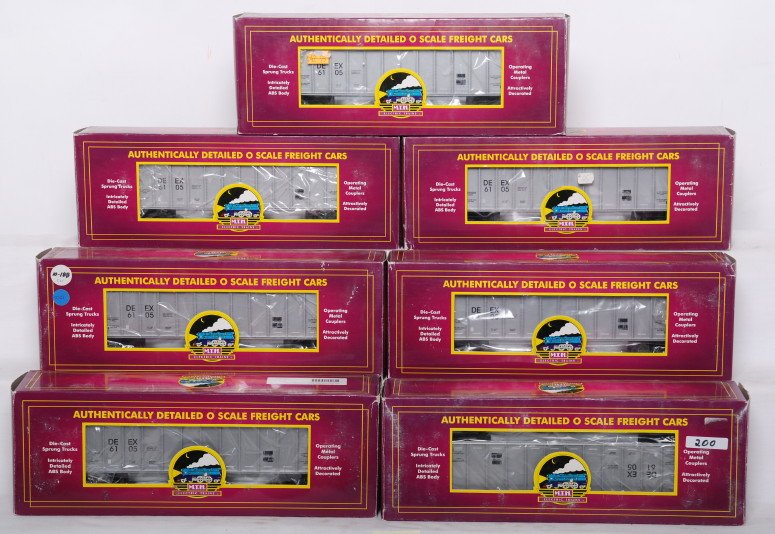 7 MTH Detroit Edison coal hoppers: MTH modern O gauge 20-97003 Detroit Edison coal hoppers in OBs. Seven cars total in C8 condition. OBs have some wear.