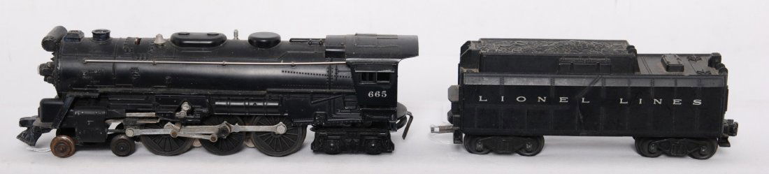 Lionel 665 steam locomotive and whistle tender: Postwar Lionel O gauge 665 steam locomotive and an unnumbered tender with whistle, C6. Tender has a bent frame.