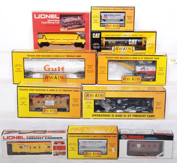 10 Railking and Lionel freight cars: Lionel and MTH Railking modern O gauge freight cars in OB. Ten freight cars include 7930 Southern Pacific snow plow, 7005F Union Pacific caboose, 79074 Western Maryland crane, 73304 Gulf tank car, 733