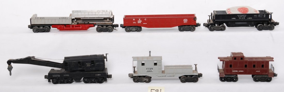 Lionel 3359, 6462, 3469, 2460, 6037, 6419: Postwar Lionel O gauge freight cars, C6. 3359 twin bin dump car, 6462 NYC gondola, 3469 auto dump car, 2460 operating work crane, 6037 caboose, and 6419 DLW work caboose.
