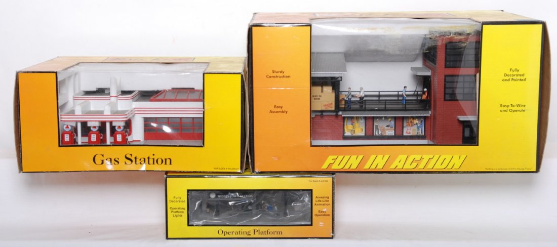 Railking operating dock, Citgo, and station platfo: MTH Railking modern O gauge accessories in OBs. Includes 9110 transfer dock, 9113 Citgo station missing Citgo sign from roof, and 9125 operating station platform. Items are C7-8 with layout use, two c