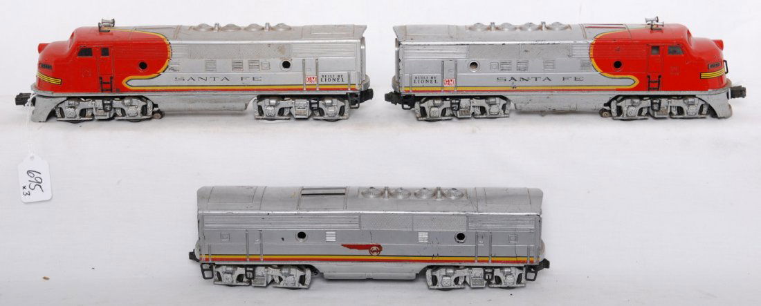 Lionel 2343P, 2343C, 2343T Santa Fe F3 A-B-A units: Postwar Lionel O gauge 2343P, 2343C, and 2343T Santa Fe F3 diesel locomotives, C5-6 with missing porthole lens, and dummy unit has a cracked plastic cab ladder and missing hand rail.