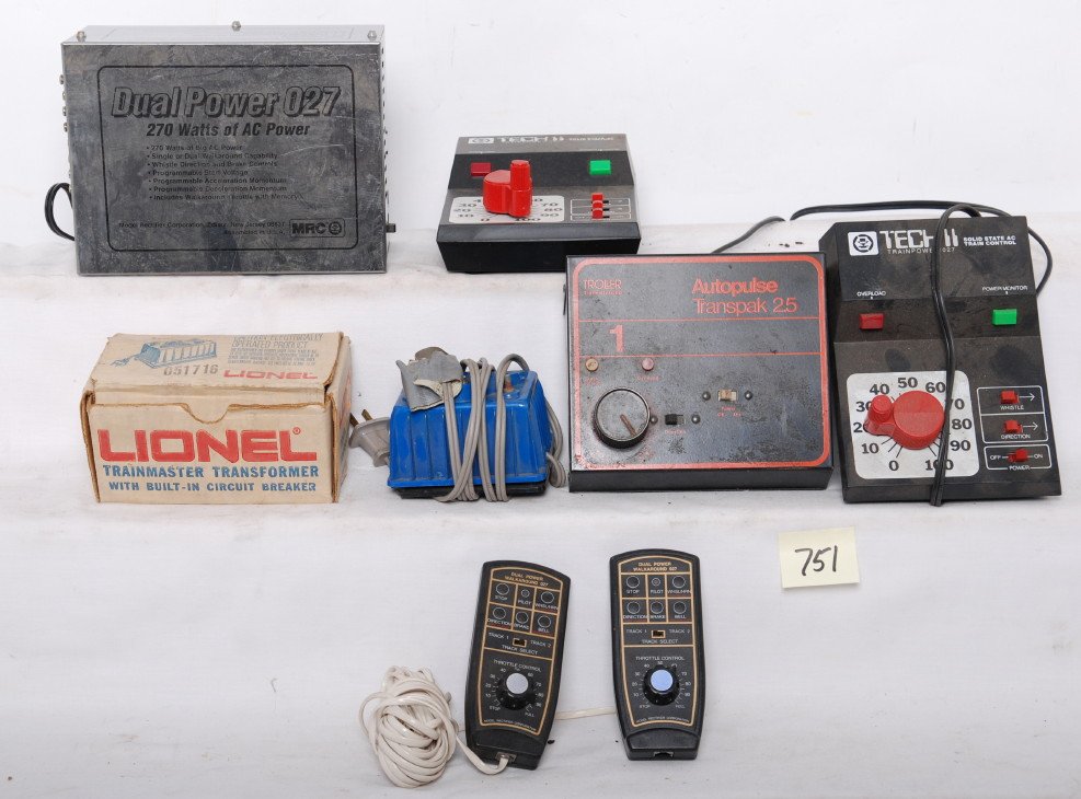 Lionel, MRC, Troller, transformers: Modern era Lionel 4150 in OB, 4150 no box. MRC Dual Power 027 with two Walkaround controllers, two TechII. Troller Transpak 2.5. Transformers look C6.