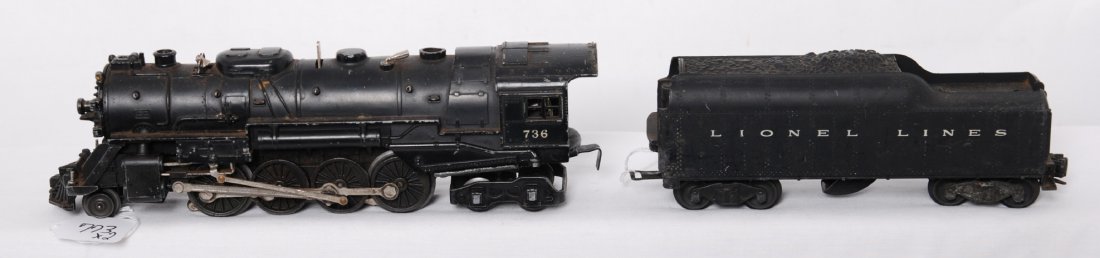 Lionel 736 steam locomotive and 2046W tender: Postwar Lionel O gauge 736 steam locomotive with 2046W tender with whistle. Loco has bent cab corner, C5.