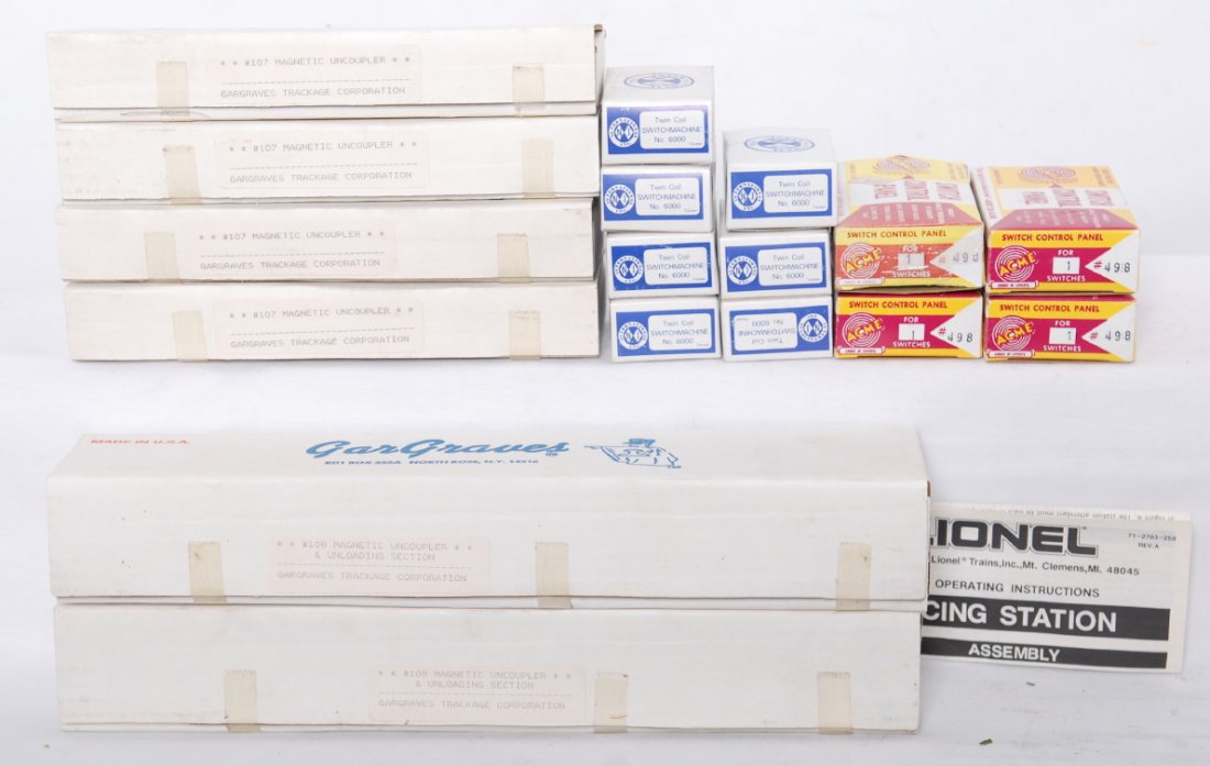 GarGraves uncouplers in OB, NJ switch machines, mo: Modern era GarGraves uncouplers in original boxes, two 108, four 107. Four Acme 498 switch control panels in OB. Seven NJ 6000 twin coil switch machines in OB, C9-10.