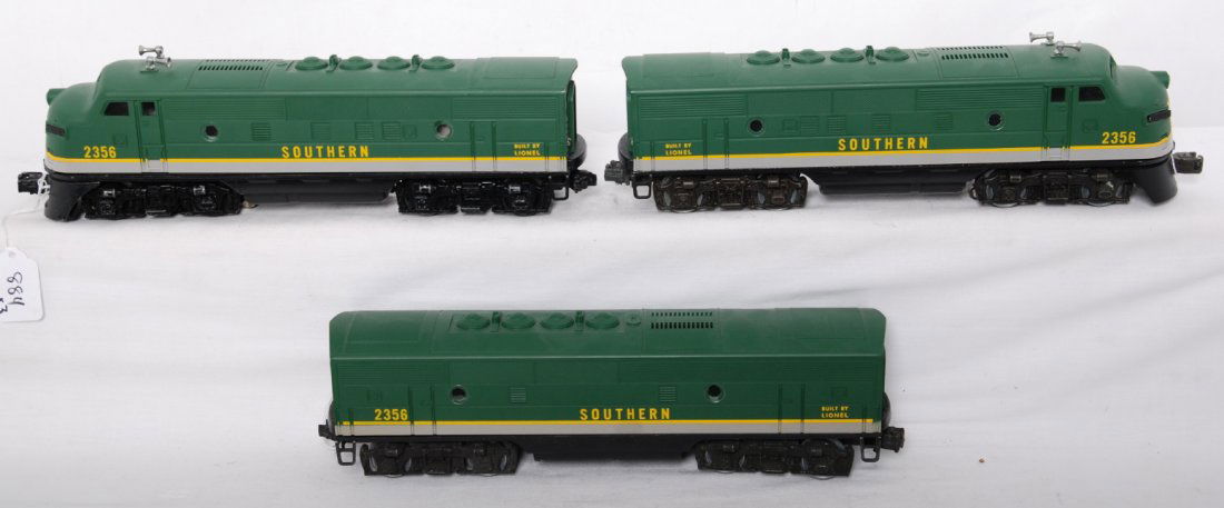 Lionel 2356 Southern F3 diesel A-B-A: Lionel 2356 Southern F3 diesel A-B-A units. Shells are modern era reproductions. Chassis are restored postwar. Trains look C7-8 with a missing porthole lens. Powered unit has a horn glued on.