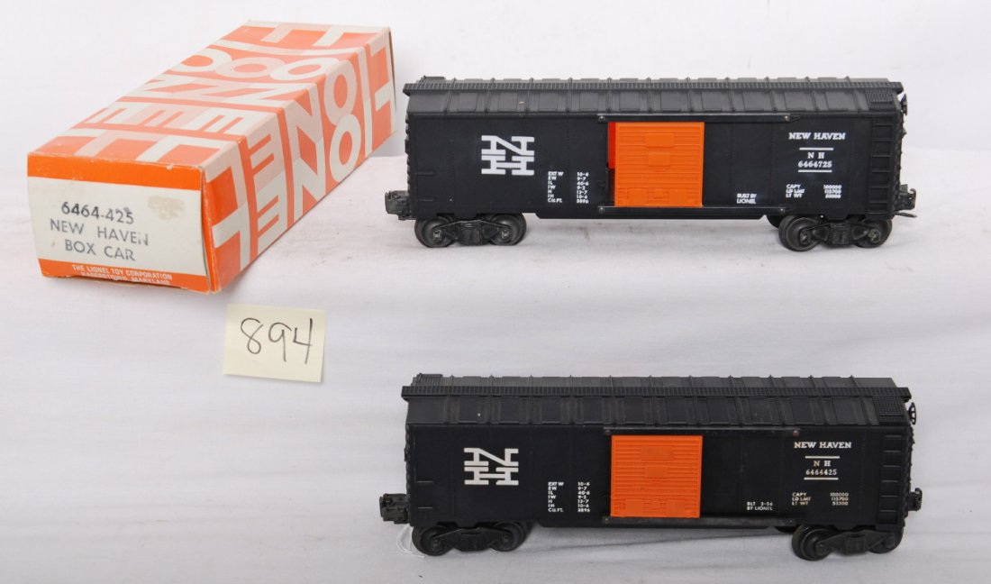 Lionel 6464-425 and 6464-725 New Haven boxcars: Postwar Lionel O gauge 6464-425 and 6464-725 New Haven boxcars, C7-8. One correct two comma 6464-425 original box for the 6464-725 car included, C7 area.
