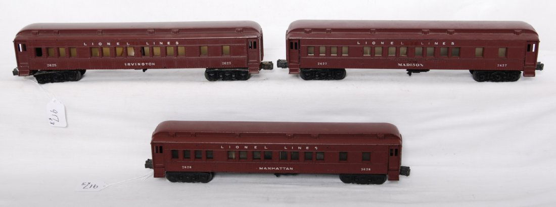 Lionel 2625, 2627, and 2628 Madison passenger cars: Postwar Lionel O gauge Madison style Pullman passenger cars, 2625 Irvington, 2627 Madison, and 2628 Manhattan. 2627 has a tiny nick to shell, 2628 has a chip to lower corner of shell, and all cars hav