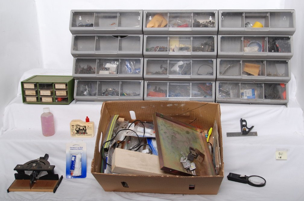 4 boxes of part, tools and more: Four boxes of Lionel parts, hobby tools and more. Parts are mostly common parts and some Gargraves parts. Good box of hobby tools as well. See photos for best description. This lot is sold as is.