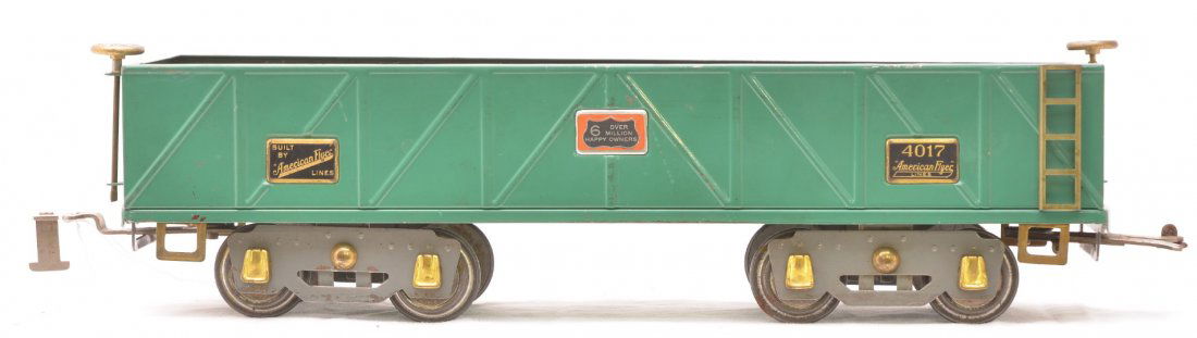 Am Flyer Prewar 4017 Green Sand Car: American Flyer prewar wide gauge 4017 green sand car with gray flex trucks, brass trim and journals. There is a spot of rust on one end of the car, otherwise car is C7.