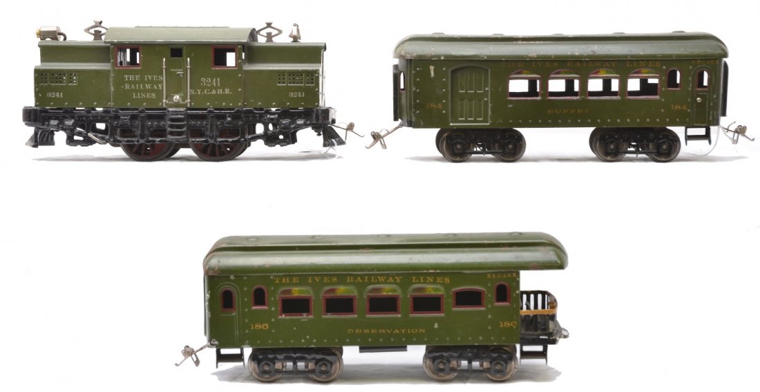 Ives Olive Green Pass Set 700 3241 184 185: Ives prewar wide gauge olive green passenger set no. 700 containing; 3241 electric 0-4-0 loco, 184 Buffet car and a 186 observation. The loco is C6 and the cars are C5.