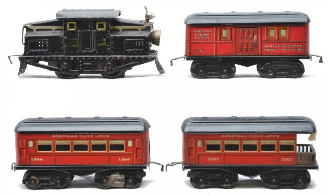 AF 1218 Steeple Cab Loco Litho 1205 1306 1207: American Flyer prewar O gauge 1218 steeple cab 0-4-0 electric loco with three red lithographed passenger cars that have black roofs; 1205 baggage, 1306 coach and a 1207 observation. The loco and car r