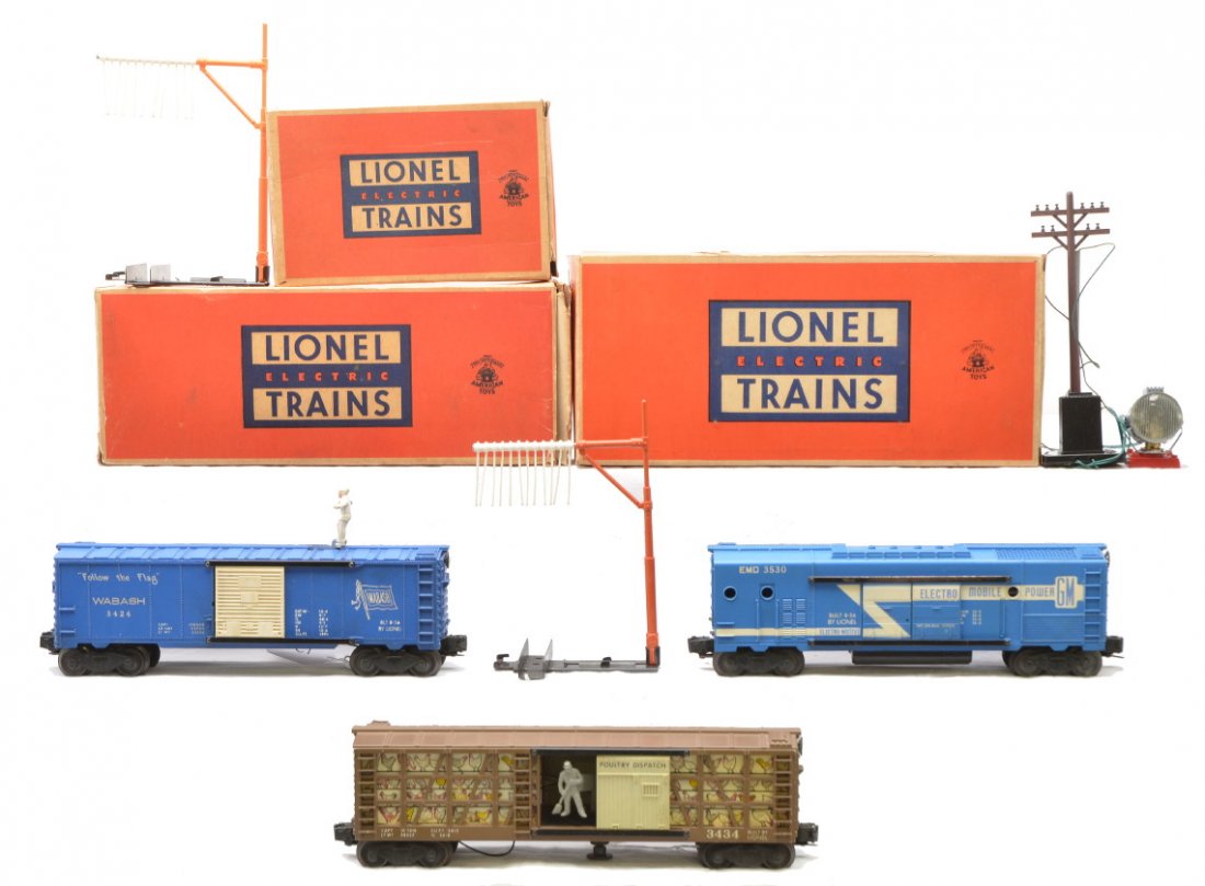 Lionel 3530 Generator 3434 Poultry 3424 Brakeman: Lionel postwar 3530 operating generator car with a searchlight, telephone pole and instruction sheet in OB and a 3434 operating poultry dispatch car. One door guide on the 3530 has corrosion, otherwis