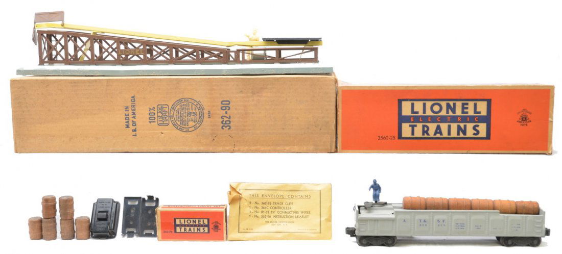 Lionel 362 Barrel Loader 3562-25 Barrel Car OBs: Lionel postwar 362 barrel loader with individual OB of six wooden barrels, 364C controller, two track clips and envelope all in OB. One side of the base of the barrel loader had gravel from a layout g