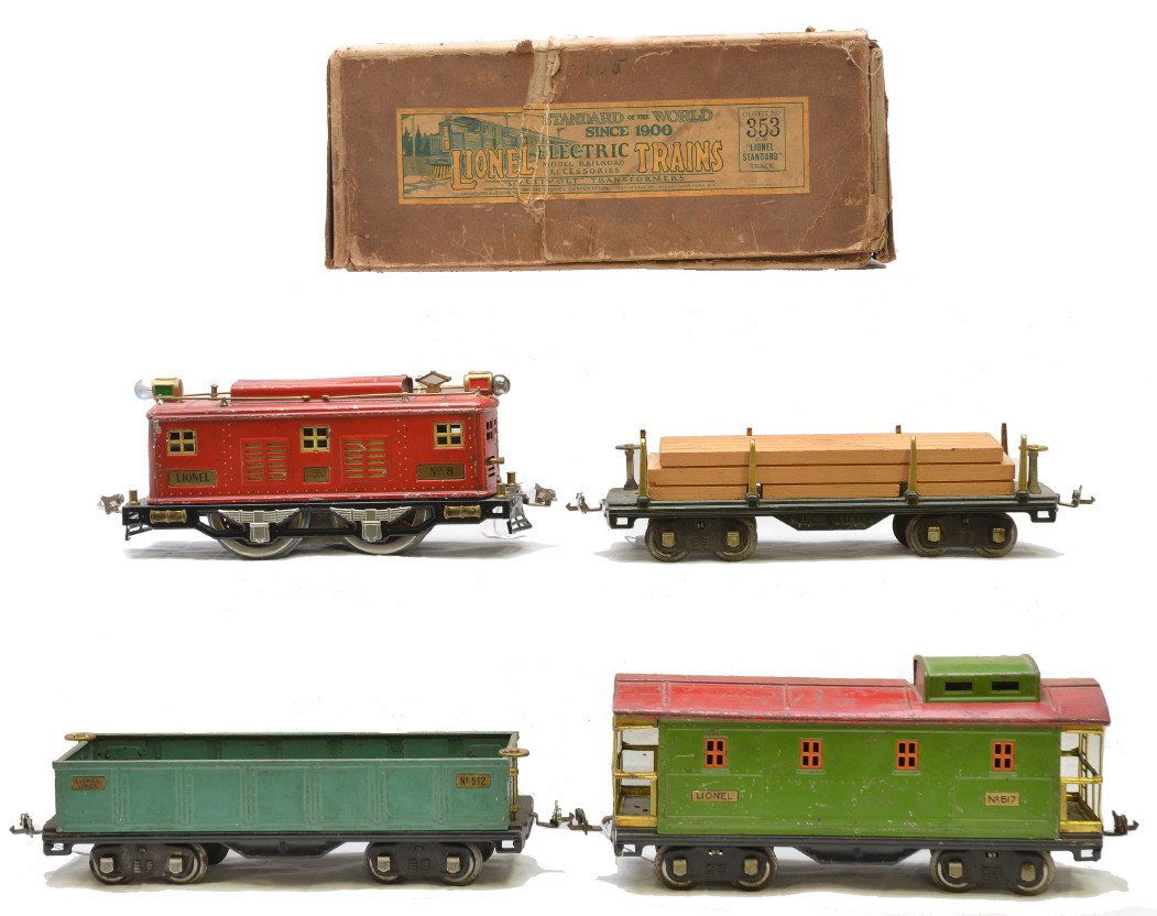 Lionel Freight Set no. 353 8 511 512 517 Boxed: Lionel prewar standard gauge freight set no. 353 in set box containing; 8 red 0-4-0 electric loco, 511 dark green lumber car, 512 peacock gondola and a 517 pea green caboose with red roof. The cars ha