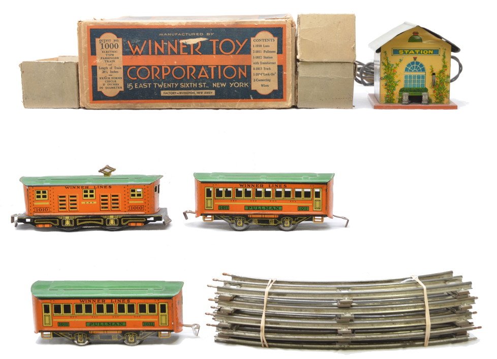 Winner Lines Litho Set 1000 1010 2-1011 1012: Winner Toy Corp. lithographed Winner Lines passenger set no. 1000 in set box with original cardboard inserts including; 1010 electric 0-4-0 loco, two 1011 Pullmans, 1012 station with transformer, eigh