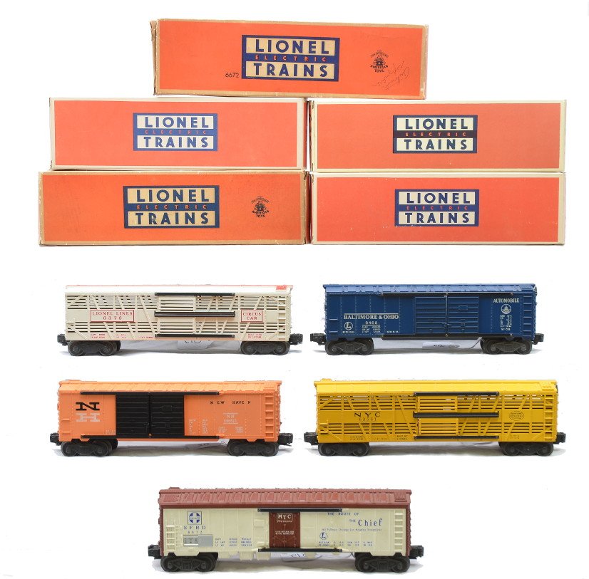 Lionel Freights 6356 6468 6468-25 6672 6376: Lionel postwar freight cars; 6356 New York Central System stock car, 6468 Baltimore & Ohio boxcar and 6468-25 New Haven boxcar all in reproduction box, 6672 Santa Fe refrigerator car and 6376 Circus c