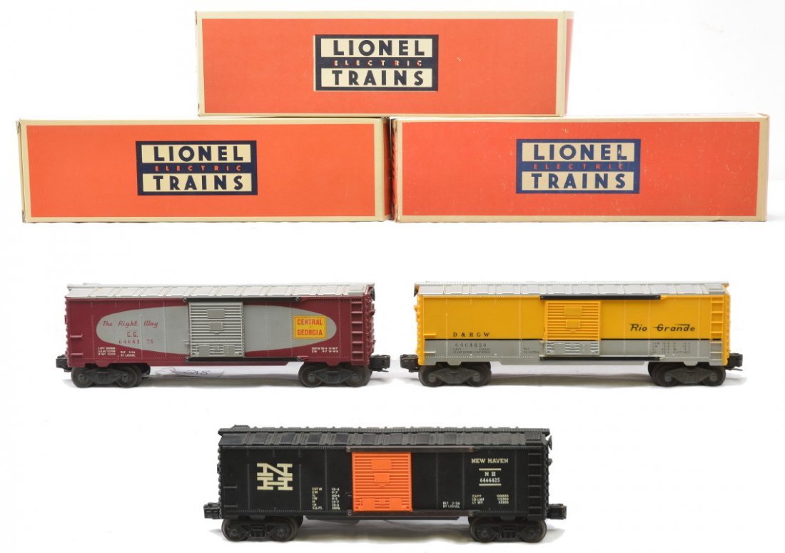 Lionel 6464-375 CofG 6464-425 NH 6464-650 RG: Lionel postwar 6464-375 Central of Georgia type IIb boxcar, 6464-425 New Haven type III and a 6464-650 Rio Grande type III boxcar all in reproduction boxes. The 6464-425 has AAR trucks and the doors o