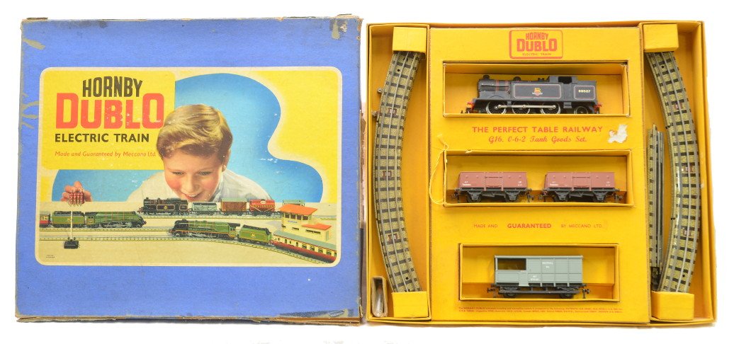 Hornby Dublo G16 Tank Goods Set Boxed: Hornby Dublo manufactured by Meccano Limited, England G16 three rail tank goods set in OB with original cardboard inserts containing; loco, two open wagons, brake van, and track. Set is C8. The box li